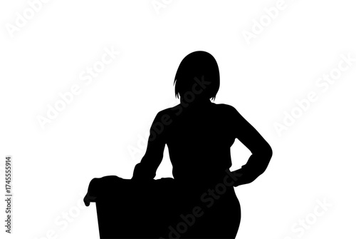 Silhouette of a confident woman standing with hand on hip against a white background