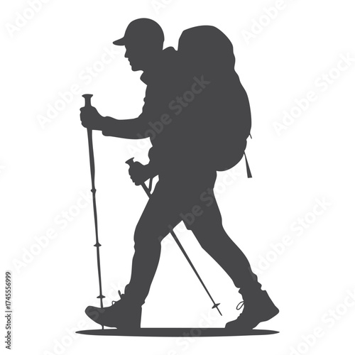 Man hiking with backpack and trekking poles silhouette