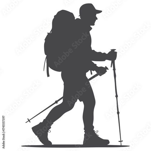 Silhouette of a hiker with a backpack and trekking poles walking