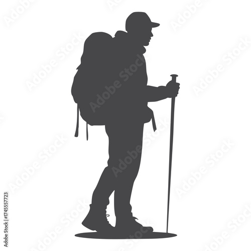 Silhouette of a hiker with a backpack and trekking poles