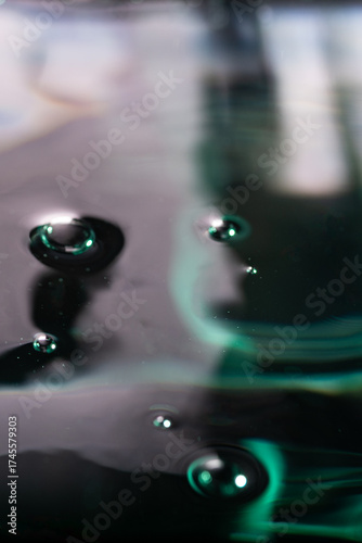 277.Small Bubbles and Reflections on Glossy Dark Liquid