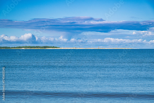 looking across the Gulf of Mexico at Cape San Blas Florida, Port St. Joe blue water cloud scape blue sky
