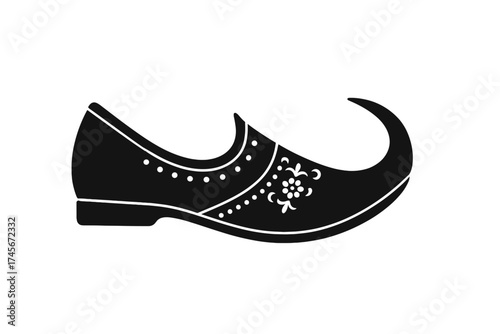 Traditional Indian shoe vector icon. Turkish or Arabic oriental footwear silhouette. Aladdin jutti or mojari slipper with ethnic floral ornament. Isolated on white background.