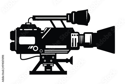Silhouette of a Professional Video Camera with Tripod for Film Production
