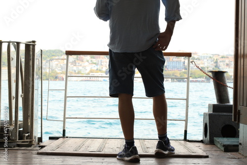 Photography The man watching Istanbul from the ferry