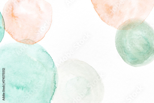 Pastel abstract watercolor artwork with soft orange and teal circular shapes on white background.