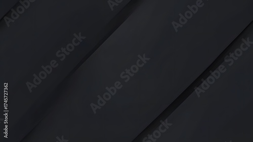 Dark grey overlapping planes create a sophisticated and modern background texture.