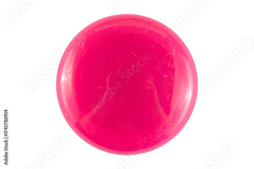 Pink round badge or magnet button with glossy surface and circular shape used for fridge decoration, branding design, or promotional accessory mockup