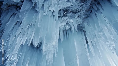 Stunning Close-Up of Numerous Icicles Hanging from a Frozen Surface, Winter Wonderland.