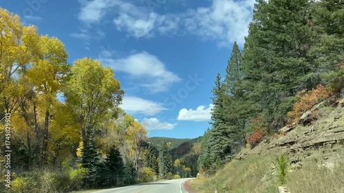 High Road to Taos Scenic Byway in New Mexico near Apache Canyon. Beautiful autumn colors, rugged terrain of the Sangre de Cristo Mountains, Carson National Forest. New Mexico highway 518.
