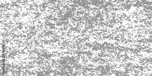 A vintage black and white grunge wall texture design with a seamless stone pattern