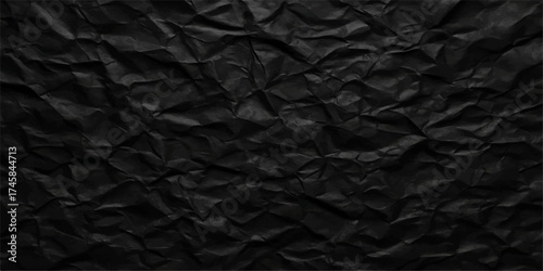 Dark, textured black paper and leather backgrounds show a rough, crumpled surface material with a grunge pattern