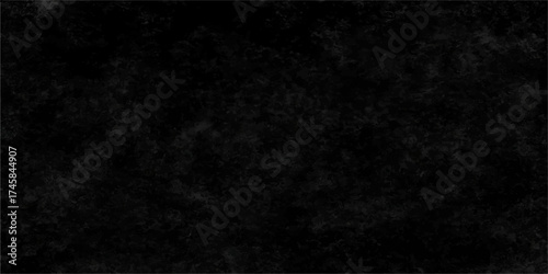 A dark grunge black paper texture background with an old, rough. Old vintage black grunge texture background surface.