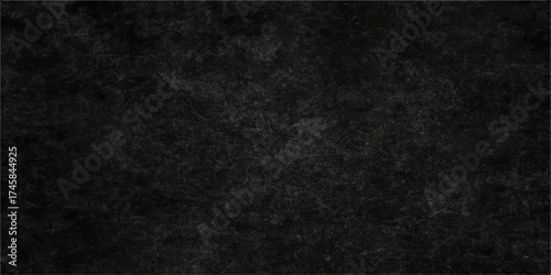 Dark black and white grunge texture of a rough, old, patterned surface, ideal for a vintage design backdrop or wallpaper