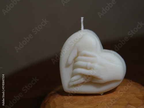 Heart Candle and Hands — Symbol of Love, Warmth and Connection