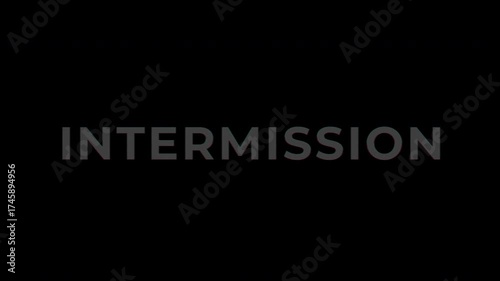 Text Animation with RGB Glitch on RGB Alpha - Intermission text on black background for cinema or theater break.