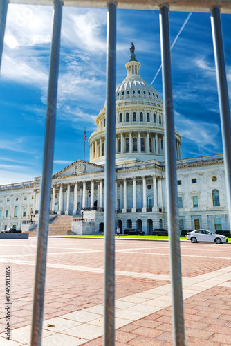 View of the Capitol dome behind a fence symbolizing the federal government shutdown