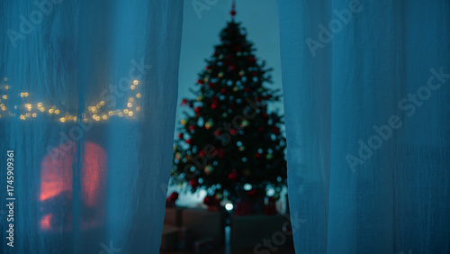 Magical Night And The Beginning Of Christmas Beyond The Curtain Of A Home Window