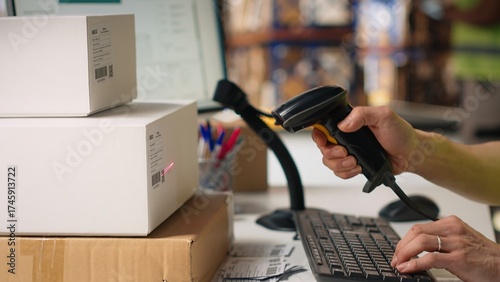 Photos Asian male staff uses handheld scanner to register airway bill information, updating the package tracking software in real time with barcode reader and shipment details