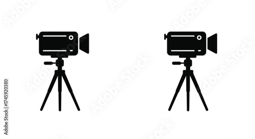 Two black film cameras with tripods simple vector illustration on white