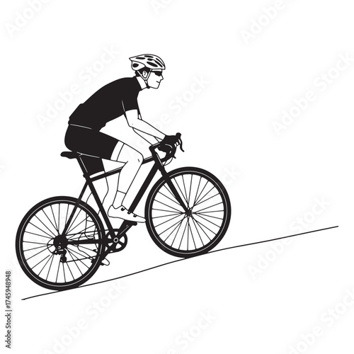 Cyclist wearing helmet and sunglasses riding bicycle uphill
