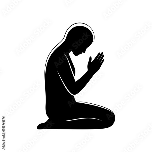 Silhouette of a person kneeling and praying