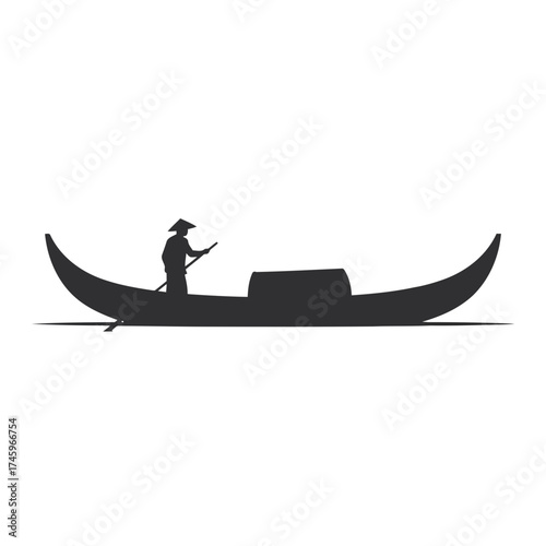 Silhouette of a person in a traditional boat with a long oar