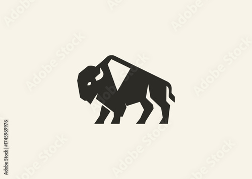 A simple geometric bison logo, symbolizing strength, resilience, and grounded power through clean angular lines