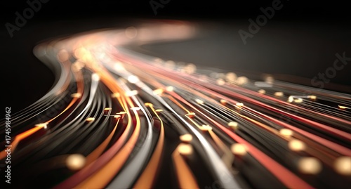 Abstract depiction of glowing, curved light trails with particles against dark background