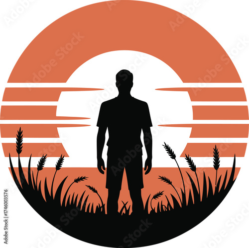 Man standing alone in a golden wheat field at sunset silhouette