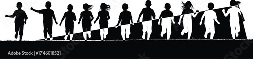 Group of happy children running together outdoors, kids silhouette on grass field, childhood freedom, friendship, fun and playful outdoor activity