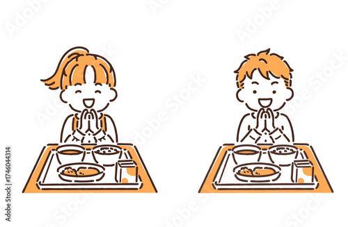 手を合わせて給食を食べようとしている小学生の男の子と女の子セット