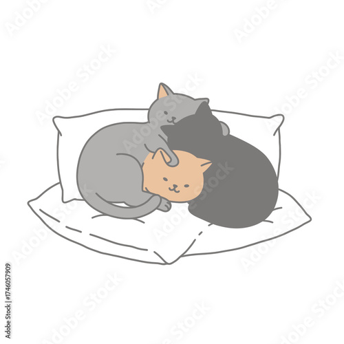 Three cute cats cuddling on a pile of pillows.