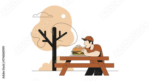 Hamburger Eater Enjoying Meal Outdoors Beside a Tree and the Artistic View