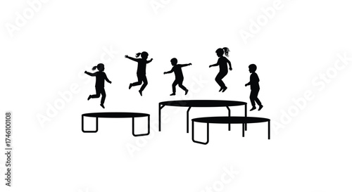Joyful children in silhouette leaping high on trampolines outdoors enjoying active playtime and healthy fun recreation.