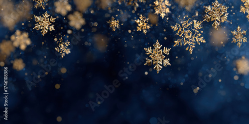 Golden snowflake banner with Christmas sparkle on dark blue background creating festive mood