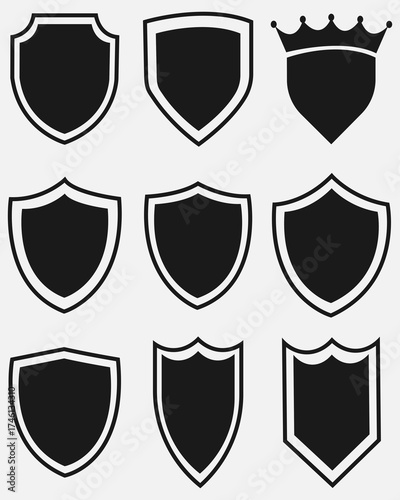 This set includes various shield shapes such as classic, rounded, pointed, and crowned designs. Perfect for use as logo bases, badges, coat of arms templates, or vintage emblem frames.