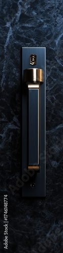 Dark navy blue door handle with brass accents.