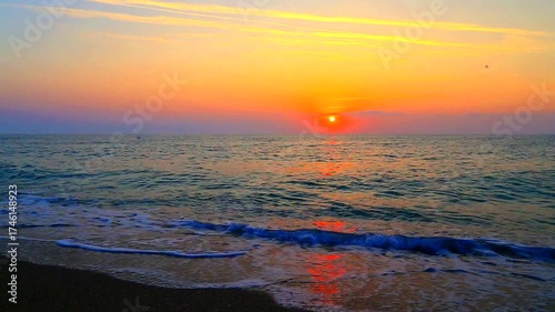 Beautiful summer sunrise over the beach