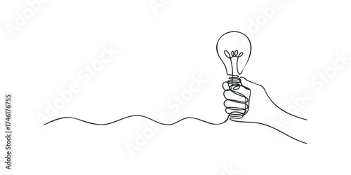 Hand holding a lightbulb symbolizing inspiration and ideas