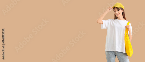Young woman in t-shirt with...