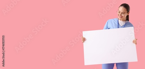 Female doctor holding blank...