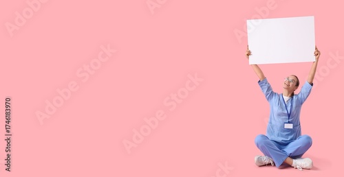 Female doctor holding blank...