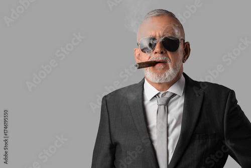 Old businessman in sunglass...