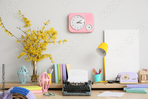 Workplace with lamp and typ...