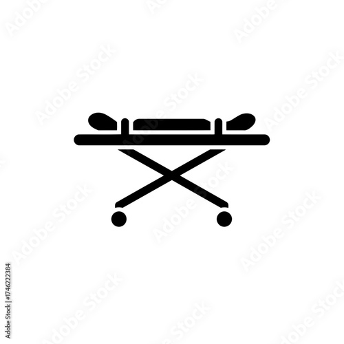 A simple black silhouette of a hospital gurney with a patient lying on top isolated on white background on transparent background