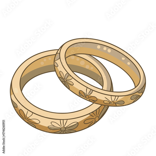 Two golden rings with floral designs delicately intertwined together