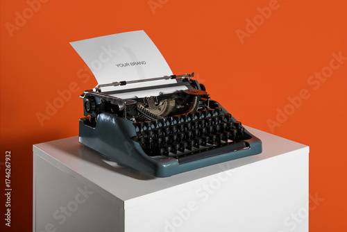 Vintage typewriter on pedes...