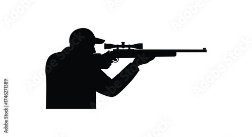 Silhouette of a person aiming a rifle with a scope in a focused shooting stance ready for action