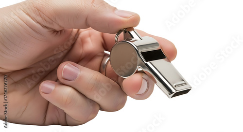 Hand Holding a Shiny Silver Metal Whistle Against a White Background